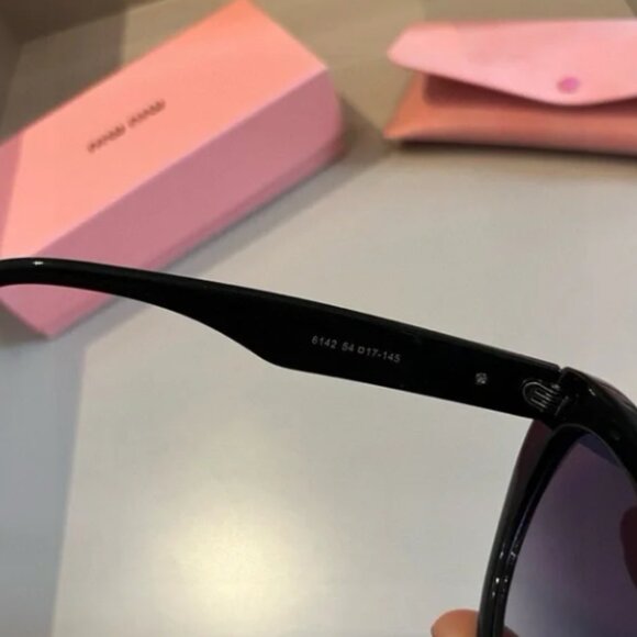 Miu Miu Sleek Black Sunglasses main image 5
